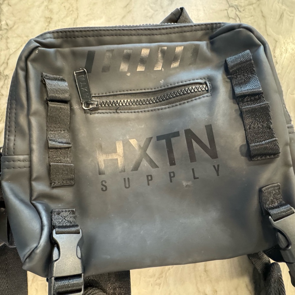 HXTN brand black cross-body bag